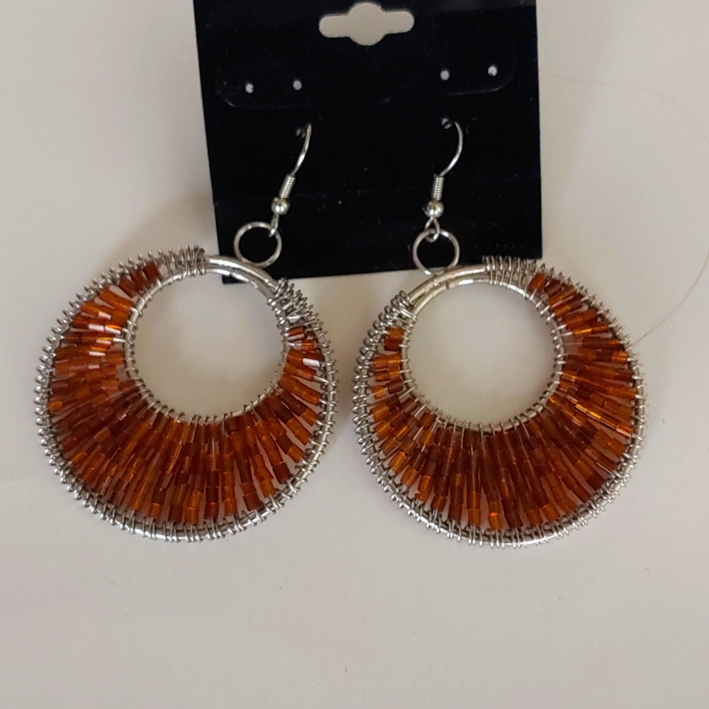 Hoop earrings with bronze beading and silver.